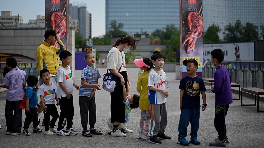 China announced it would allow couples to have three children. Credit: AFP Photo