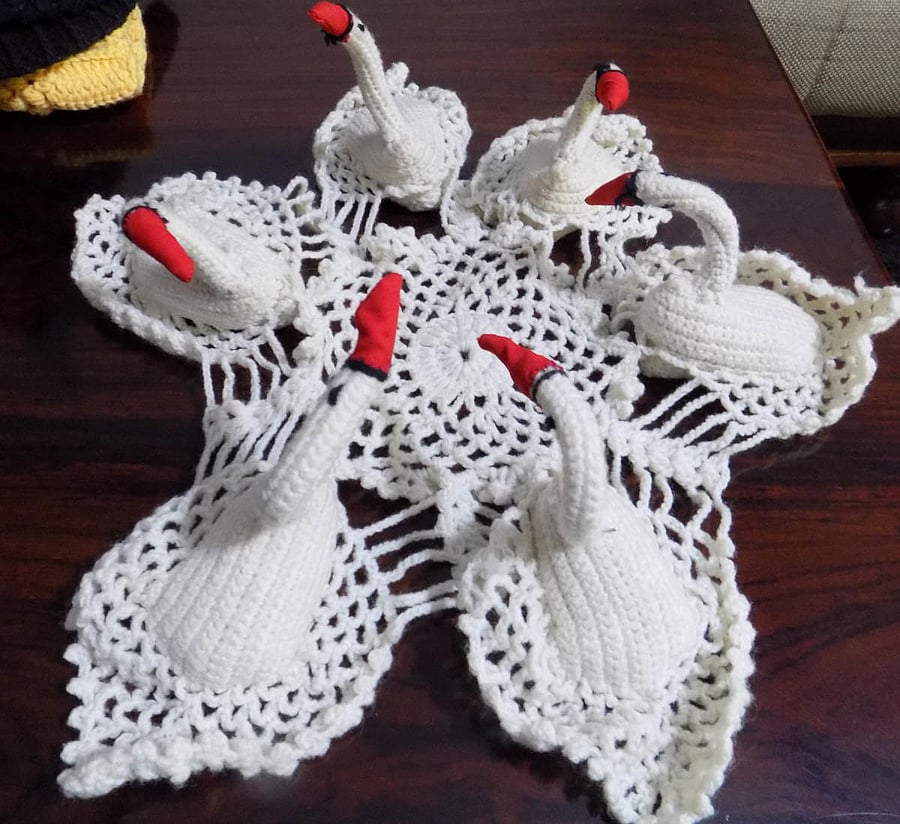 A teapoy cover featuring birds created by Sherley of Gonikoppa.