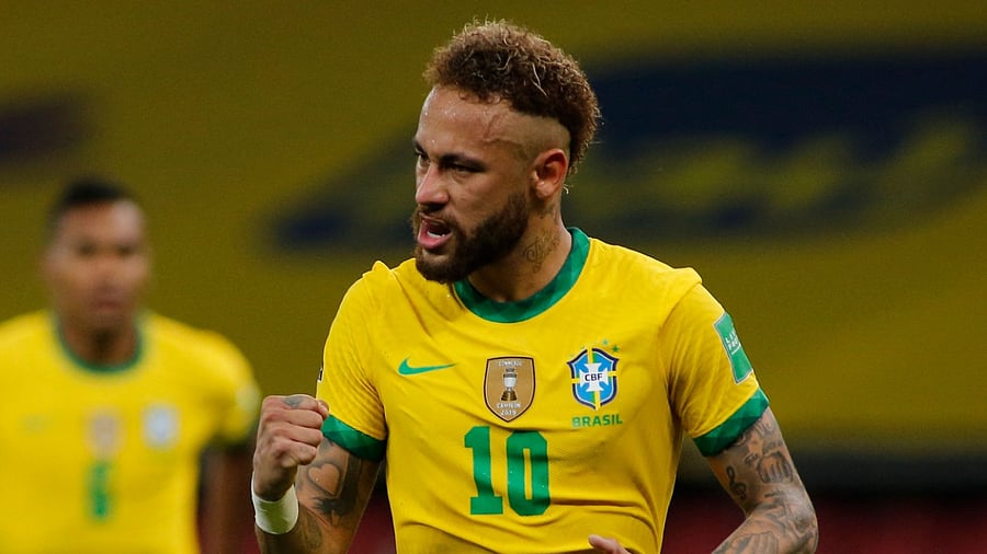 Neymar celebrates after scoring a penalty for Brazil against Ecuador during their South American qualification football match for the FIFA World Cup Qatar 2022. Credit: AFP Photo
