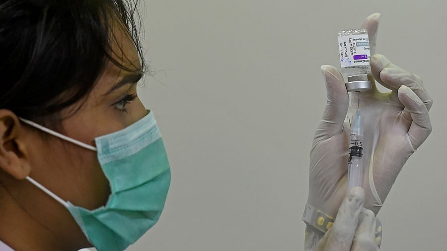 The DC later said she would stay put at the spot till he got himself vaccinated. Credit: AFP Photo