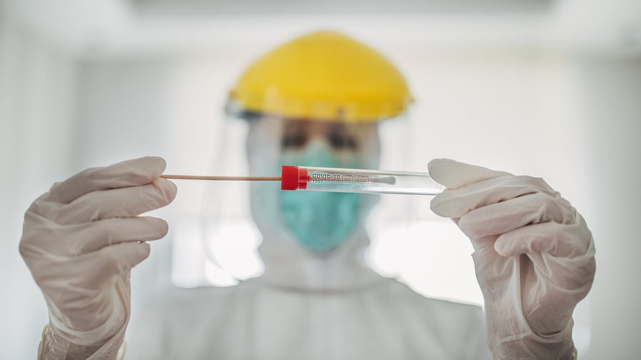 All symptomatic contacts of laboratory-confirmed cases, all symptomatic health care workers, and asymptomatic direct and high-risk contacts of a confirmed case should be tested. Credit: iStock Photo