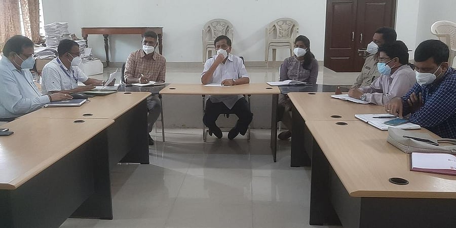 MLA K G Bopaiah chairs Covid-19 task force committee meeting in Virajpet.