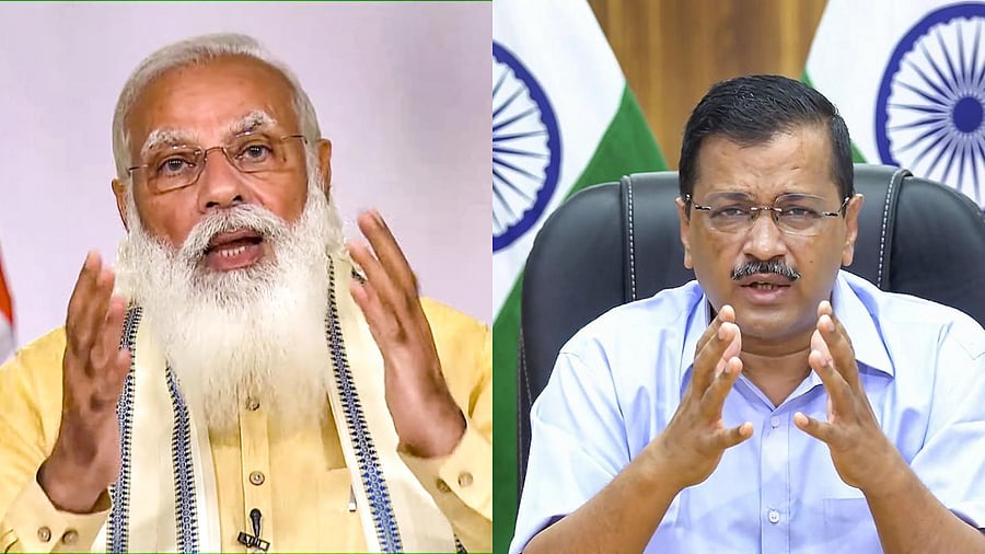 Prime Minister Narendra Modi and Delhi CM Arvind Kejriwal. Credit: PTI Photo