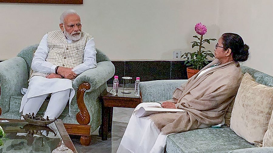 Prime Minister Narendra Modi; West Bengal CM Mamata Banerjee. Credit: PTI Photo