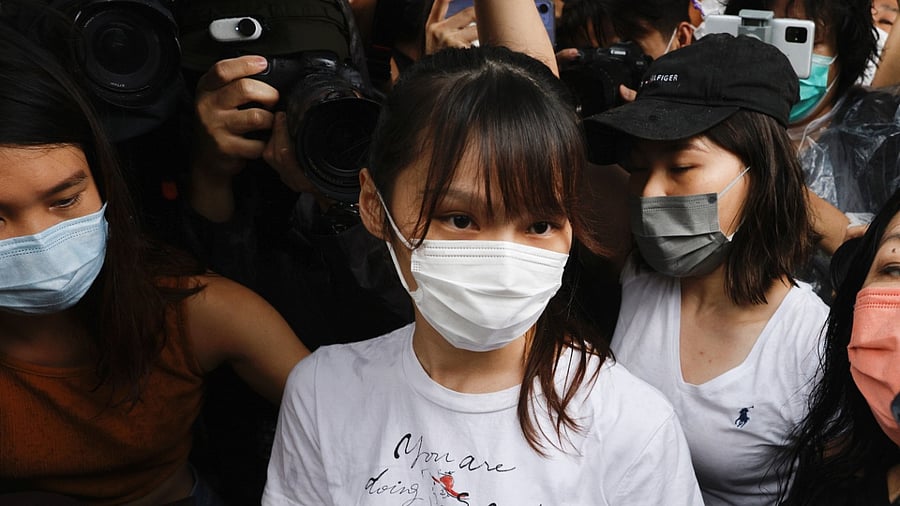 Chow, 24, was mobbed by waiting media but made no comment. Credit: Reuters Photo