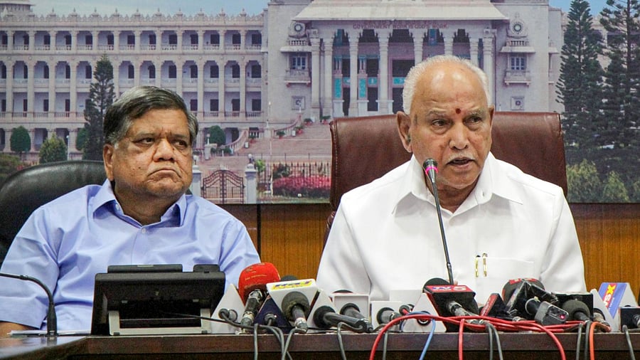 Karnataka Chief Minister B S Yediyurappa along with minister Jagadish Shettar. Credit: PTI File Photo