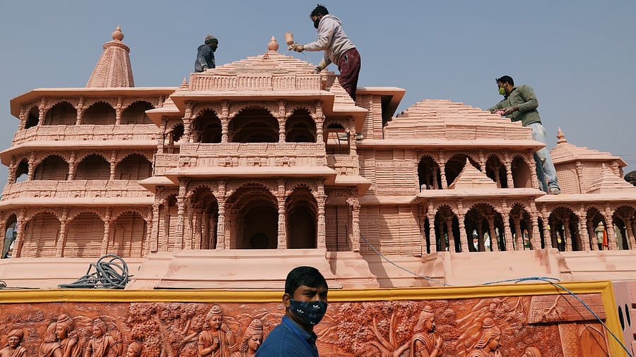 Workers give finishing touches to the model of the proposed Ram temple. Credit: Reuters Photo