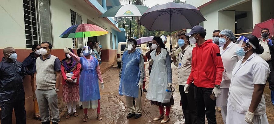 MLA K G Bopaiah visits the Covid Care Centre at Ashrama School in Thithimathi Maroor on Monday.
