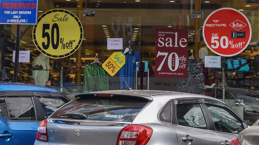 A mad rush is seen at Commercial Street when stores announce mega sales, which usually last for two to three months. Credit: DH File Photo/S K Dinesh