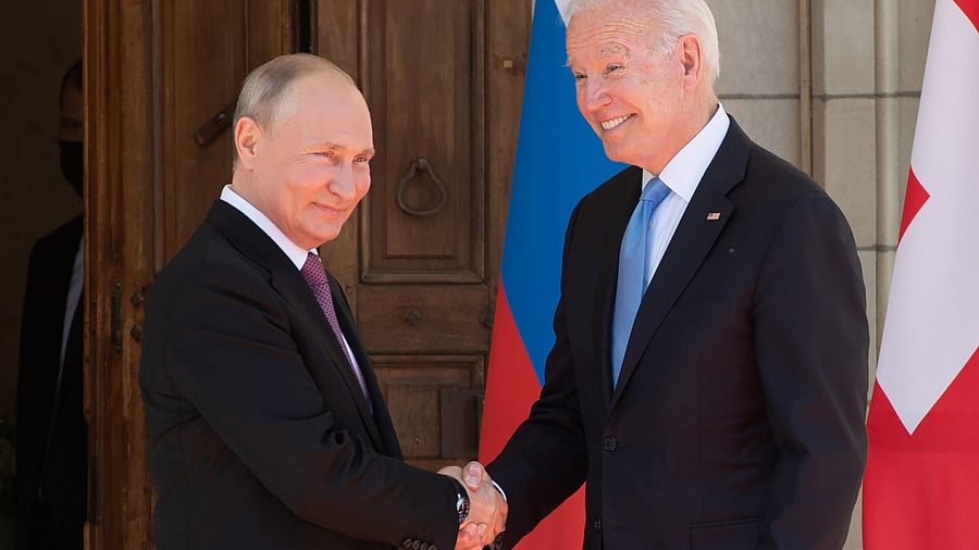 The two men shook hands outside the La Grange villa overlooking Lake Geneva. Credit: Reuters Photo