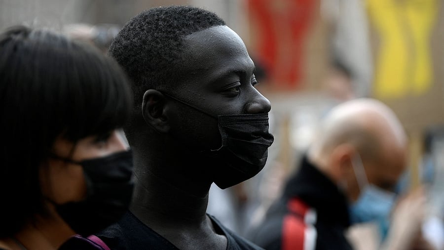 Protesters take part in a "Black lives matter" protest to demand equal rights and equal dignity for all those considered minorities, which they say are systematically oppressed and marginalised by systemic racism. Credit: AFP Photo