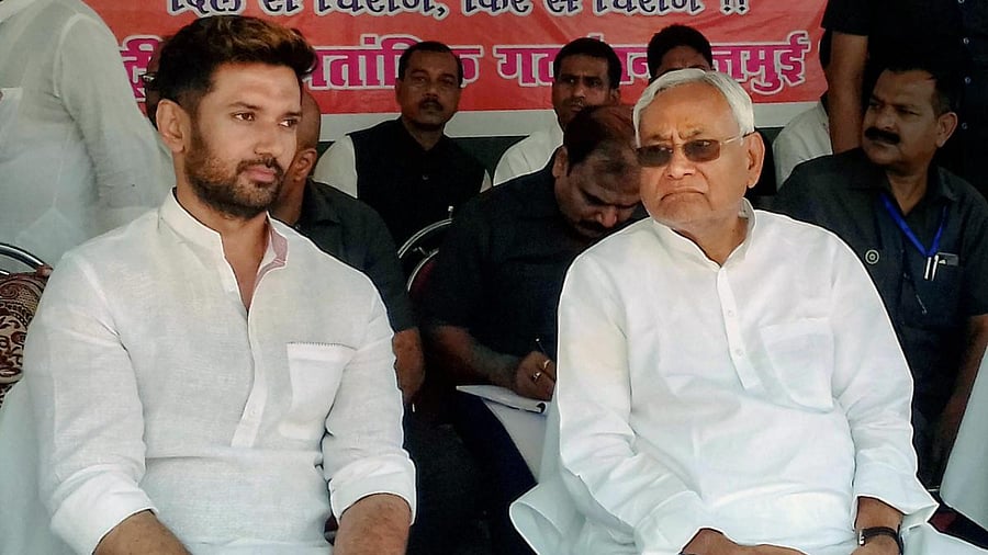 Chief Minister and Janata Dal (United) President Nitish Kumar (R) with Chirag Paswan. Credit: PTI File Photo