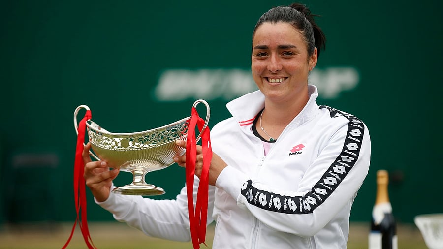 Tunisia's Ons Jabeur celebrates with the trophy after winning her final match against Russia's Daria Kasatkina. Credit: Reuters photo