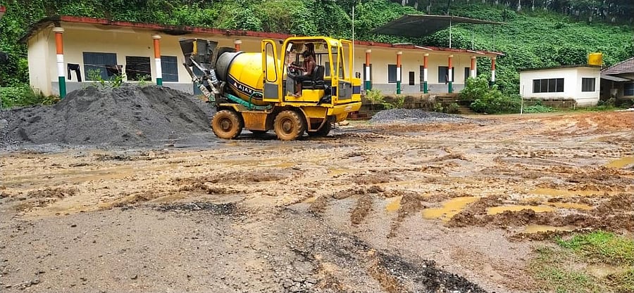 A concrete mixer is being operated on the premises of the Government Higher Primary School in Koyanadu. Credit: special arrangement