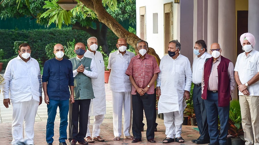 TMC leader Yashwant Sinha (4L) with other opposition leaders after a meeting at the residence of NCP President Sharad Pawar (C) in New Delhi. Credit: PTI Photo