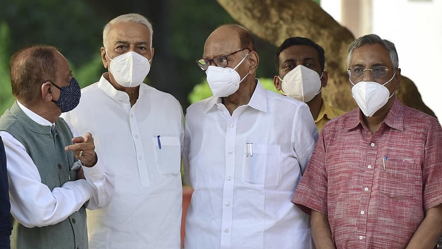 NCP Chief Sharad Pawar (C), TMC Leader Yashwant Sinha (2L), NCP leader Majeed Memon (L) and other leaders of different opposition parties, and other personalities after the meeting of the Rashtra Manch at the residence of Sharad Pawar, in New Delhi. Credit: PTI Photo