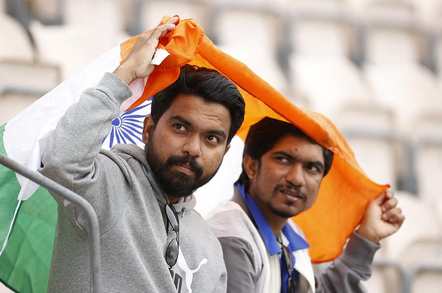 India fans in the stand wait for the start of play. Credit: Reuters Photo