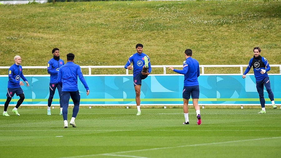 England's defender Tyrone Mings (C) and England's players take part in a training sesssion at St George’s Park in Burton-on-Trent on June 24, 2021 during the UEFA EURO 2020 European Football Championship. Credit: AFP Photo