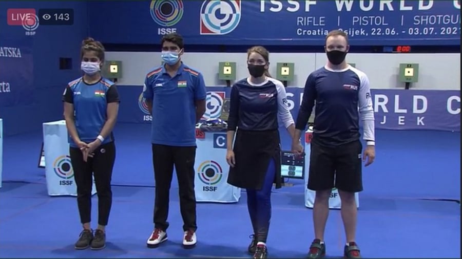 Manu Bhaker (L) and Saurabh Chaudhary (2nd L) during the medal ceremony at the ISSF Shooting World Cup. Credit: Twitter/National Rifle Association of India 