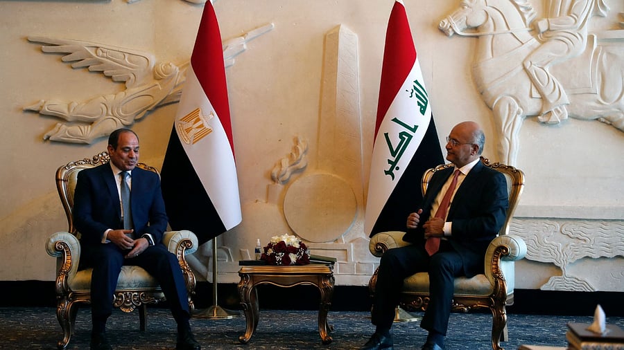 Iraqi President Barham Salih (R) receives his Egyptian counterpart Abdel Fattah al-Sisi. Credit: AFP Photo