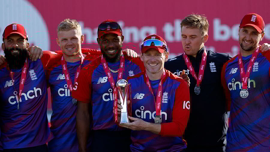 England's Captain Eoin Morgan (C) celebrates with teammates after winning the third T20 and series 3-0 between England and Sri Lanka. Credit: AFP Photo