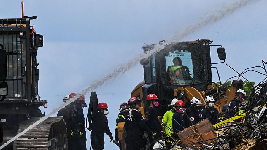 Rescue workers continue to search the rubble at the site of a collapsed building in Surfside, Florida, north of Miami Beach. Credit: AFP Photo