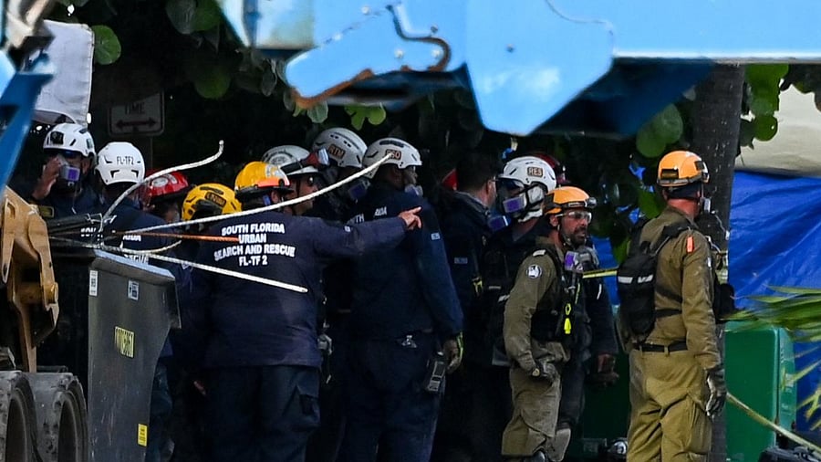 Rescue workers continue to search through rubble at the site of a collapsed building in Surfside, Florida, north of Miami Beach. Credit: AFP Photo