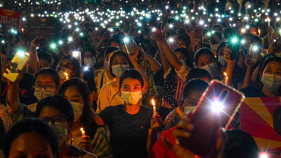 Pro-democracy posters and the three-fingered salute associated with anti-military rallies have appeared frequently in Tinder profiles. Credit: AFP Photo