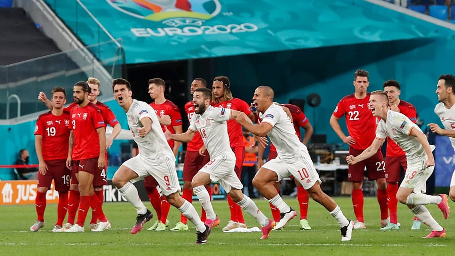 Spain's Gerard Moreno celebrates after the match with teammates. Credit: Reuters Photo