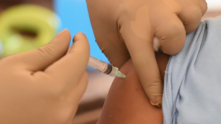 A health worker administers a dose of Covid-19 vaccine to a beneficiary at a vaccination centre in Mumbai, Sunday, July 4, 2021. Credit: PTI Photo