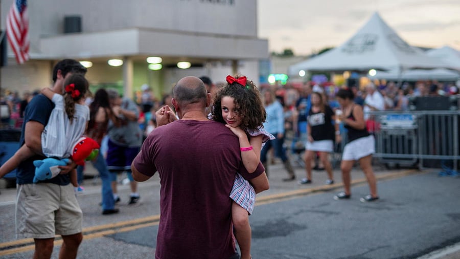 Estella Garmendia, 6, and her father Enrique Garmendia, both of Houston, dance during a Fais Do Do, or Cajun dance party, which is part of 4th of July weekend celebrations in Erath, Louisiana, US. Credit: Reuters Photo