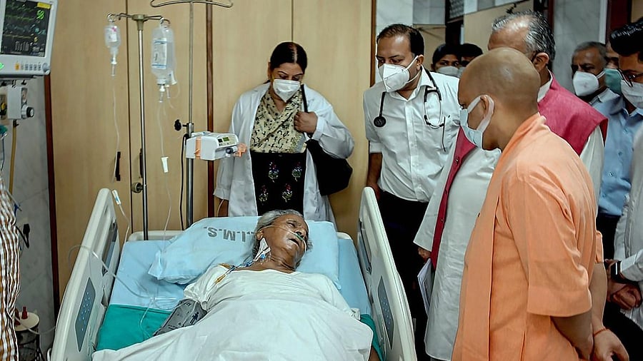 UP Chief Minister Yogi Adityanath visits former chief minister Kalyan Singh. Credit: PTI Photo