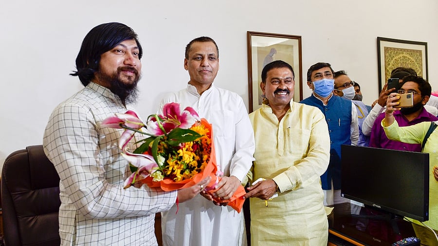 Ministers of State for Home Affairs Nisith Pramanik, Nityanand Rai and Ajay Kumar during Nisith's charge taking process at his office in New Delhi. Credit: PTI Photo