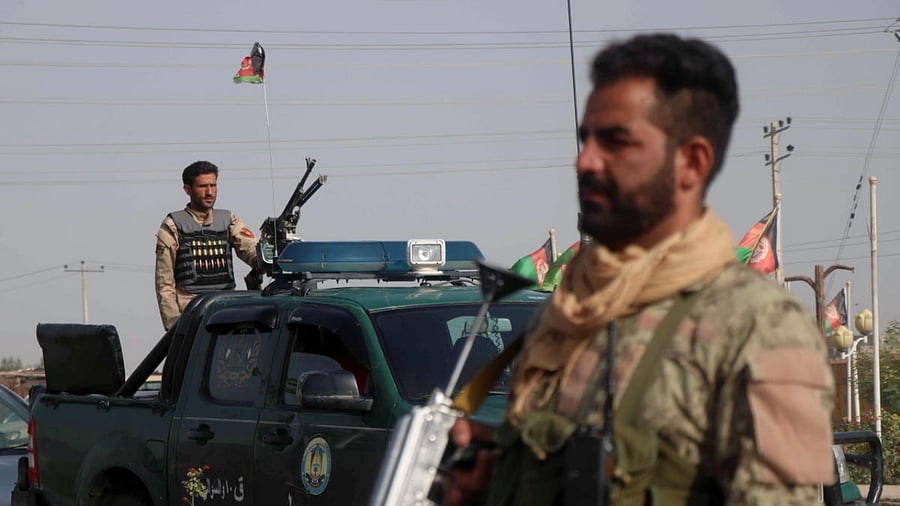 Afghan security forces keep watch at a checkpoint in the Guzara district of Herat province, Afghanistan. Credit: Reuters Photo