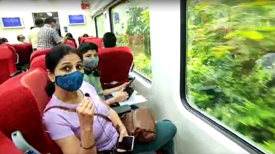 Priti Bharadwaj and her son Nitin, from Bengaluru, travelled to Mangaluru to be a part of Karnataka's first vistadome coach train. Credit: Screenshot via DH Video