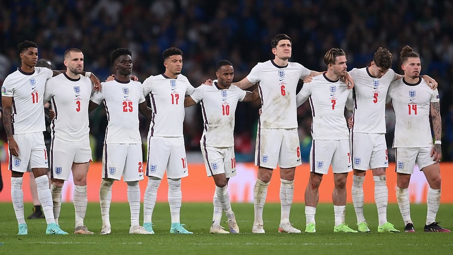 England's players watch the penalty shoot out during the Euro 2020 final. Credit: AFP Photo