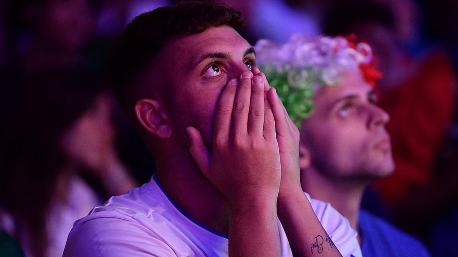 As the Italian players sang and danced, kissed and cried, bathed in sparkling ticker tape, for the English it was another false dawn. Credit: AFP Photo