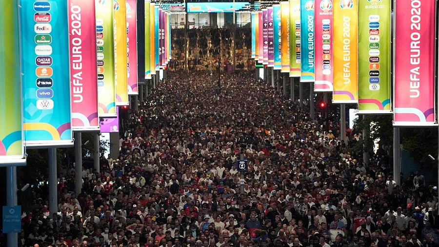 Crowds leave Wembley Stadium after Italy wins the UEFA EURO 2020 final football match between England and Italy in northwest London on July 11, 2021. Credit: AFP Photo