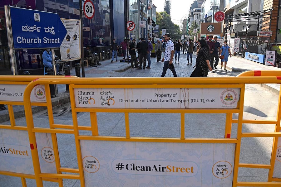 People walk on a traffic-free Church Street in Bengaluru on a Sunday in March this year. Credit: DH File Photo/PUSHKAR V