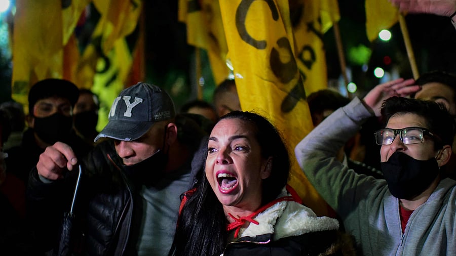 One person has died and more than 100 were arrested. Credit: AFP Photo