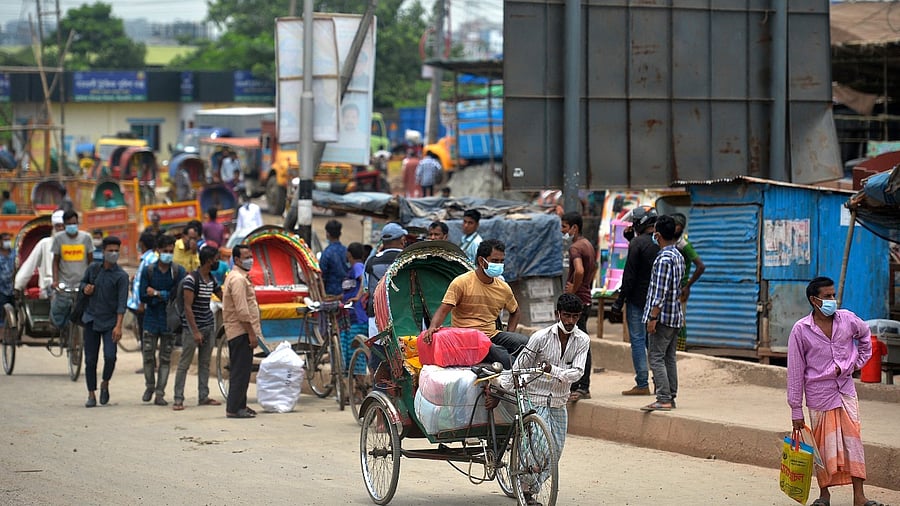 People leave the capital as the government loosened a lockdown imposed as a preventive measure against the Covid-19 coronavirus ahead of the Muslim festival of Eid al-Adha in Dhaka. Credit: AFP Photo