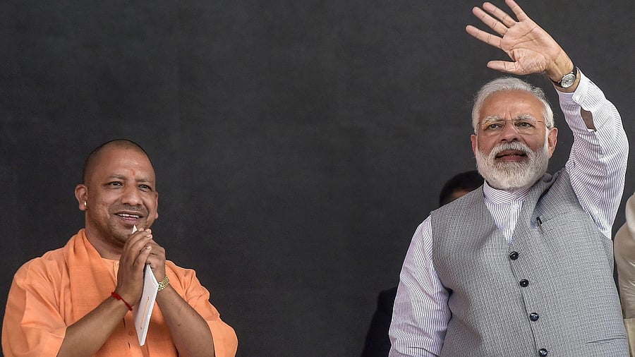 Narendra Modi (R) and Yogi Adityanath. Credit: PTI File photo
