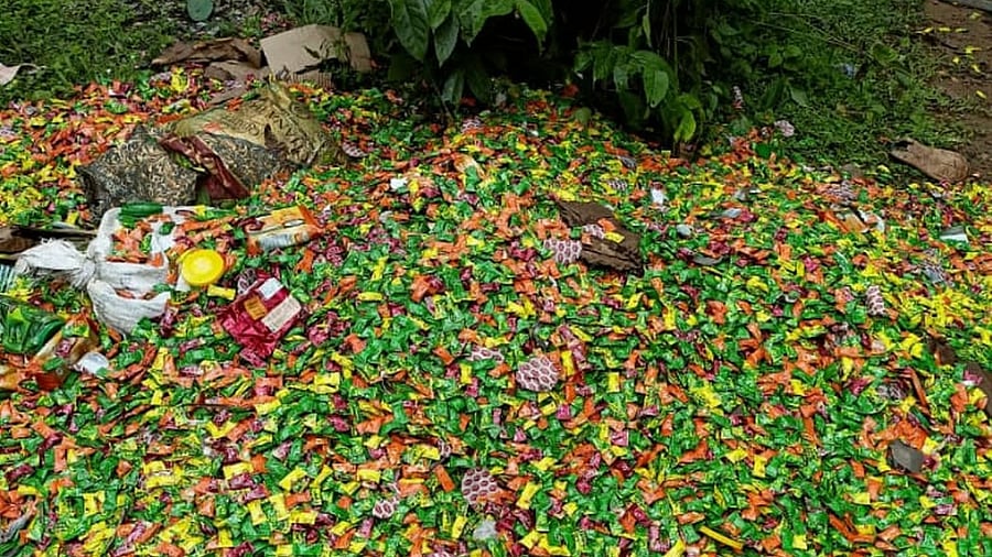 Candies dumped near Hoodlamane Cross in Sirsi taluk. Credit: DH Photo