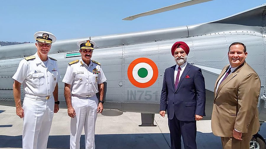 Indian Ambassador to the United States, Taranjit Singh Sandhu and Indian Navy Deputy Chief Vice Admiral Ravneet Singh while accepting the two MH-60 Romeo helicopters at the US Navy base in San Diego. Credit: PTI Photo