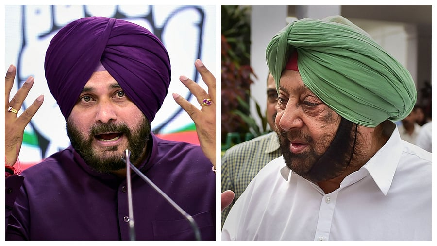 Navjot Singh Sidhu; Punjab Chief Minister Amarinder Singh. Credit: PTI Photo