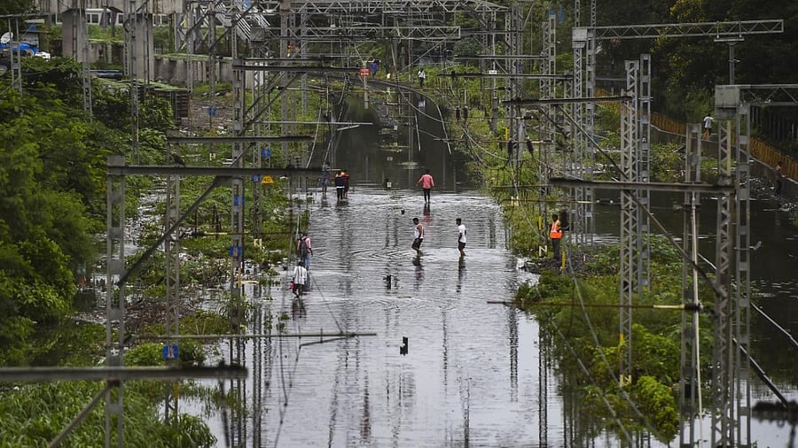 Four auto-rickshaws were damaged in one of the wall collapse incidents. Credit: PTI Photo