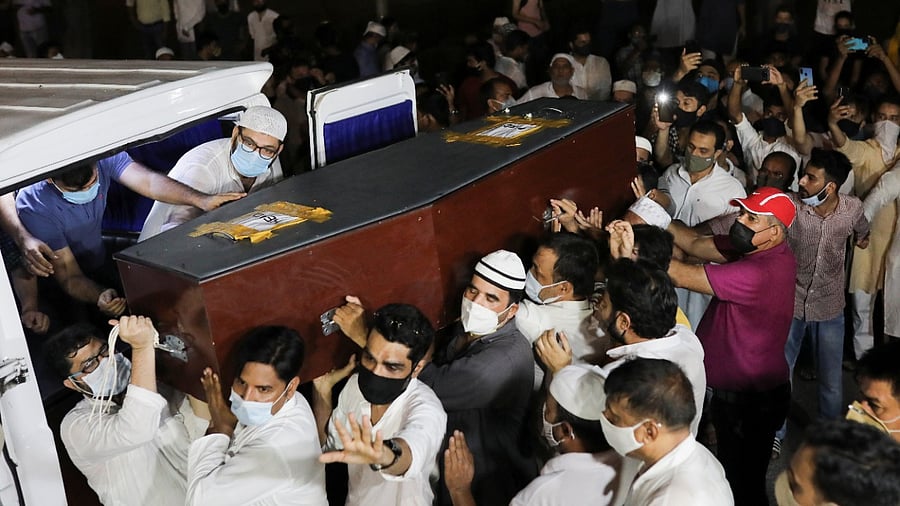 People carry the coffin of Reuters journalist Danish Siddiqui for his funeral prayers inside the premises of Jamia Millia Islamia university in New Delhi. Credit: Reuters Photo