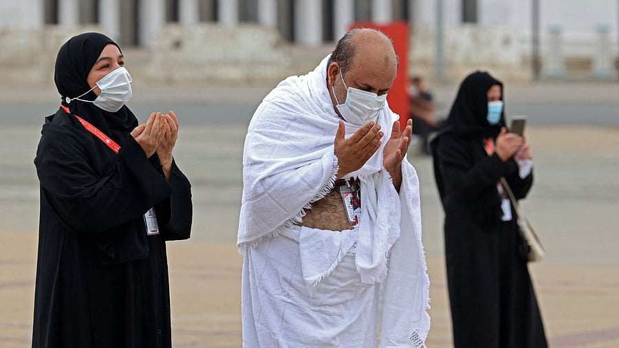Mulism pilgrims pray next to Saudi Arabia's Mount Arafat, also known as Jabal al-Rahma during Hajj. Credit: AFP Photo