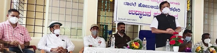 Virajpet MLA K G Bopaiah speaks after inaugurating the Nadakacheri building at Balele near Gonikoppa.