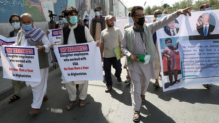  Former Afghan interpreters, who worked with US troops in Afghanistan, demonstrate in Kabul. Credit: Reuters File Photo